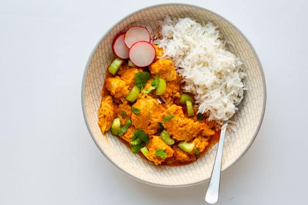 Chicken Coconut Curry with rice in a bowl