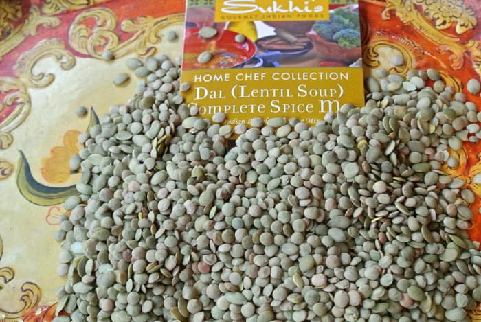 dal spice mix packet next to dried lentils