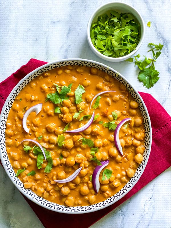 Bowl of vegan tikka masala with cilantro as garnish