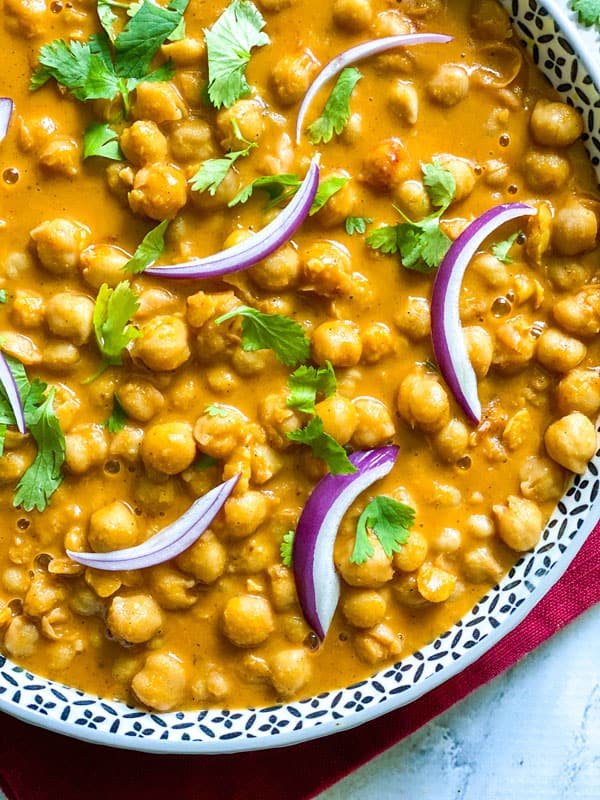 A close up shot of vegan tikka masala curry in a bowl