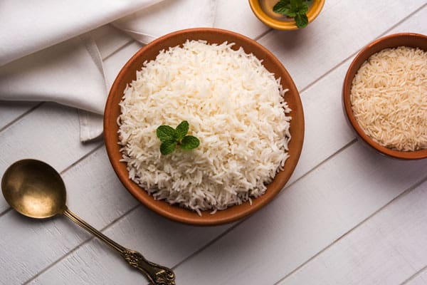 Bowl of Cooked and Raw basmati Rice