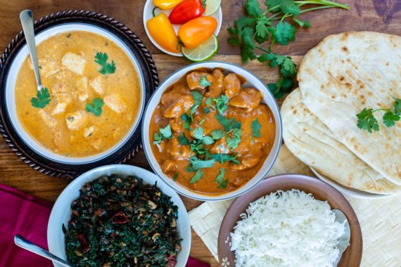 Indian meal with food on a table